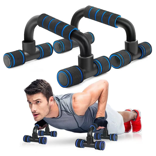 Man using push-up bars with foam grips for home strength training exercise