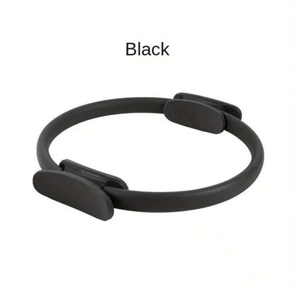 Black Pilates ring with padded grips for fitness and strength training