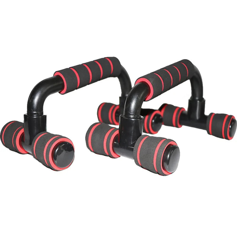 Pair of black and red push-up bars with foam padded grips for home strength training