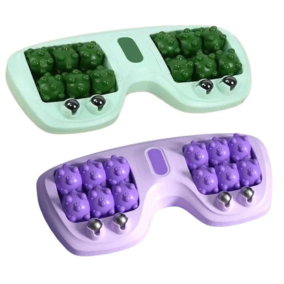 Two colorful eye massage masks with textured nodules and metal massage balls for relaxation