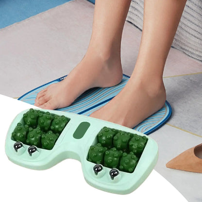 Foot massage roller with textured green knobs and bare feet on exercise mat